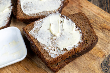 Black rye bread with butter