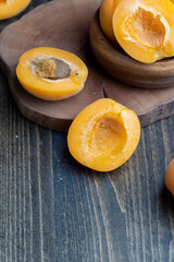 Orange-colored ripe apricot cut into pieces