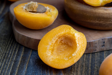Orange-colored ripe apricot cut into pieces