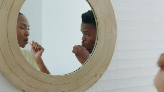 Dental Hygiene, Toothbrush And Black Couple, Brushing Teeth Together, Communication During Morning Routine, Mirror And Bathroom. Black Woman, Man And Cleaning Teeth With Face Reflection.