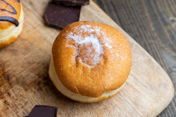 sweet donuts with milk cream filling inside