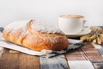 fresh loaf of bread and coffee