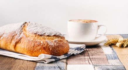 fresh loaf of bread and coffee