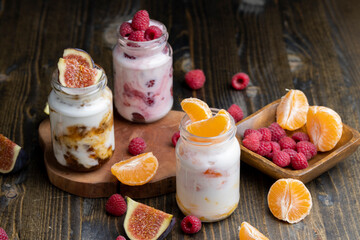 Milk yogurt with tangerine, close up