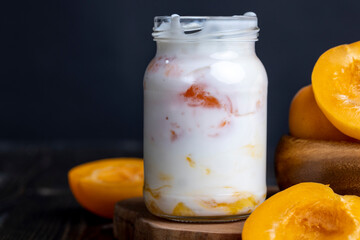yogurt with fresh berries and apricot jam
