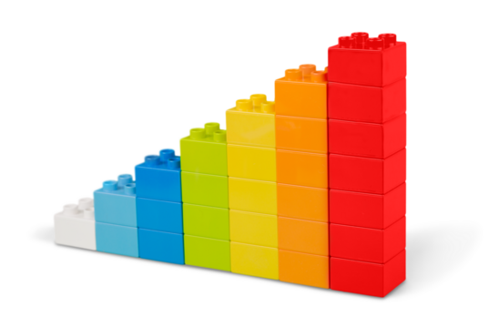 Colorful children building bricks on background