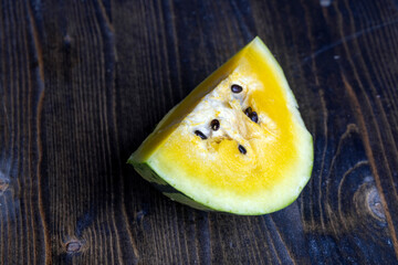 Ripe and juicy yellow watermelon cut into pieces