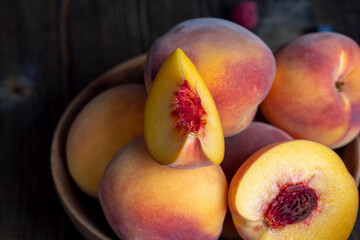 Fototapeta na wymiar Sliced ripe and very soft peaches,