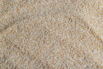 Brown crystalline sugar from cane
