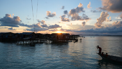 Beautiful sunset time at a bajau village, Pulau Omadal.
