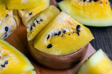 Ripe and juicy yellow watermelon cut into pieces
