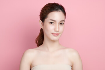 Beautiful young asian woman with clean fresh skin on pink background, Face care, Facial treatment, Cosmetology, beauty and spa, Asian women portrait.