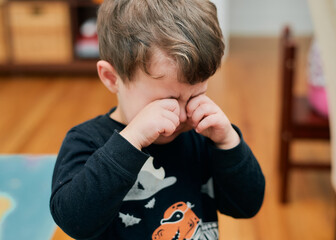 Upset young boy is crying and whining - obrazy, fototapety, plakaty