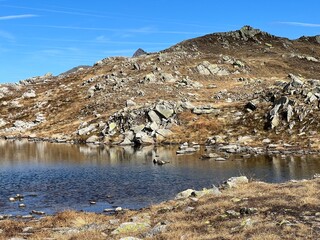 Early autumn on the alpine lakes Laghi della Valletta in the mountainous area of the St. Gotthard Pass (Gotthardpass), Airolo - Canton of Ticino (Tessin), Switzerland (Schweiz)