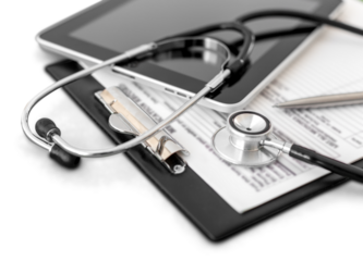 Stethoscope, tablet and medical report on white background