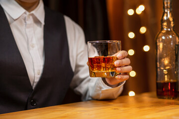 Bartender Serve Whiskey, on wood bar, 