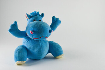 hippopotamus.plush children's toy on an isolated background. - obrazy, fototapety, plakaty