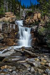 Fototapeta na wymiar The wispy water of Tangle Creek Falls in Jasper National Park, Alberta