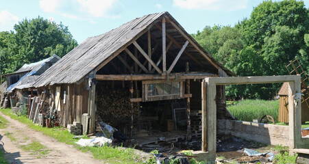 Ruined broken wooden rural barn © Aleksandr Volkov