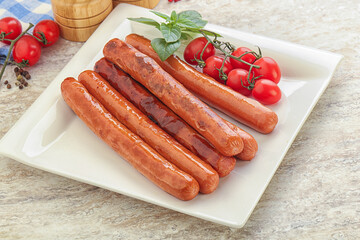 Roasted sausages in the plate