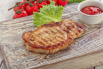 Grilled pork steak with ketchup