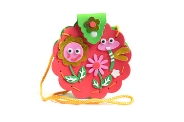 Bright children's toy bag isolated on white background.