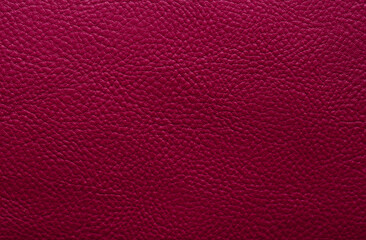 Beautiful bright eco-leather, animal skin texture in pink color, close-up as a background.