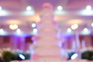 Blurred pink luxury cake in wedding ceremony love background
