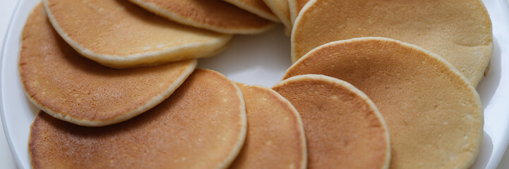 Plate with fresh tasty homemade pancake, hot delicious meal for breakfast