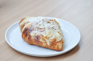 almond croissant or croissant , French croissant