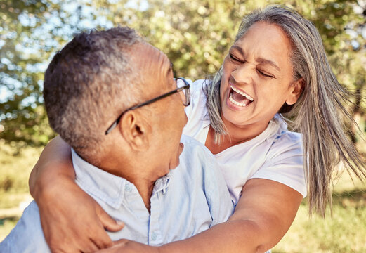 Woman, Senior Man And Surprise In Park, Shocked And Excited Hug In Outdoor Garden On Summer Holiday Weekend. Love, Retirement And Nature, A Happy Elderly Couple Embrace With Grass, Smile And Trees.