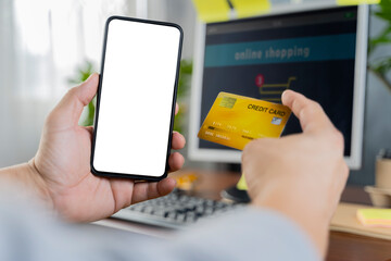 Cropped view of businessman holding smartphone with blank screen and credit card isolated on white.