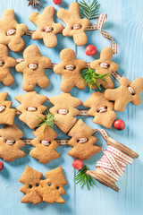 Aromatic gingerbread cookies chain as Christmas decoration.