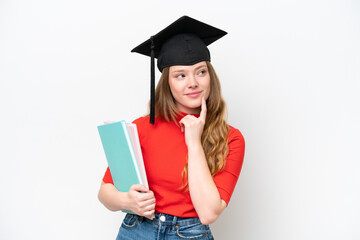 Young university graduate woman isolated on white background thinking an idea while looking up