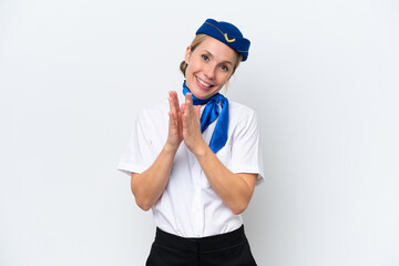 Airplane blonde stewardess woman isolated on white background applauding after presentation in a conference