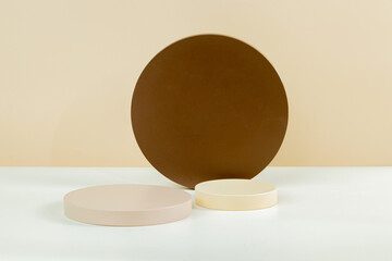 3d circle podium with various sizes, earth tone color and some white, with brown and white background