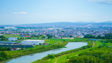 Obraz premium 地方都市の工場と街並み