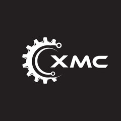XMC letter technology logo design on black background. XMC creative initials letter IT logo concept. XMC setting shape design.

