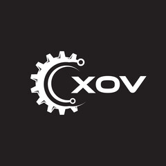 XOV letter technology logo design on black background. XOV creative initials letter IT logo concept. XOV setting shape design.
