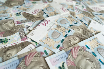 Obraz na płótnie Canvas 500 Polish zloty banknotes. PLN zł or złoty, the official currency of Poland. Five hundred złotych notes, paper bills obverse.