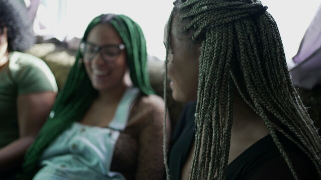 Three Young Black Women Laughing And Smiling Together. Friends Hanging Out At Home