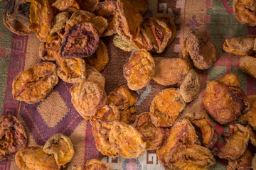 close-up shot of dried apples on rustic cloth