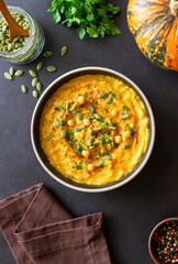 Pumpkin hummus with seeds and greens. Healthy eating. Vegetarian food.