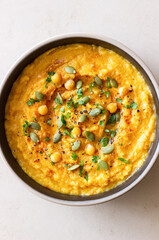 Pumpkin hummus with seeds and greens. Healthy eating. Vegetarian food.