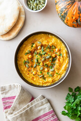 Pumpkin hummus with seeds and greens. Healthy eating. Vegetarian food.
