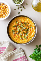Pumpkin hummus with seeds and greens. Healthy eating. Vegetarian food.