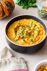 Pumpkin hummus with seeds and greens. Healthy eating. Vegetarian food.