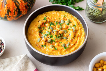 Pumpkin hummus with seeds and greens. Healthy eating. Vegetarian food.