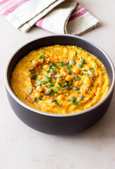 Pumpkin hummus with seeds and greens. Healthy eating. Vegetarian food.