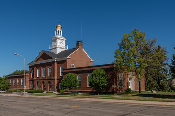 Fototapeta na wymiar Downtown Fergus Falls City Hall building in the summer. Rural Minnesota city in the USA. 